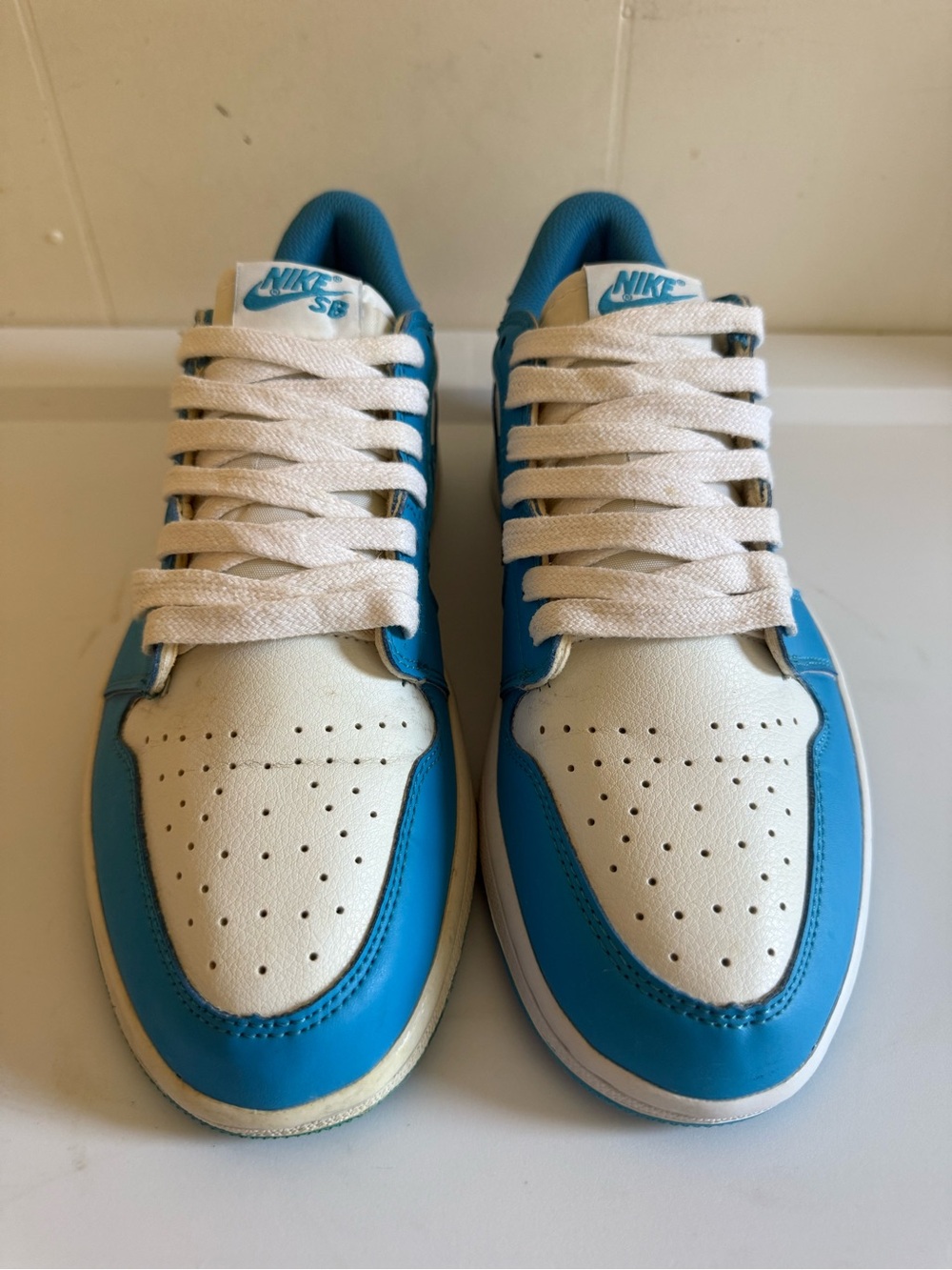 Nike SB x Air Jordan 1 Low Eric Koston UNC sneakers.